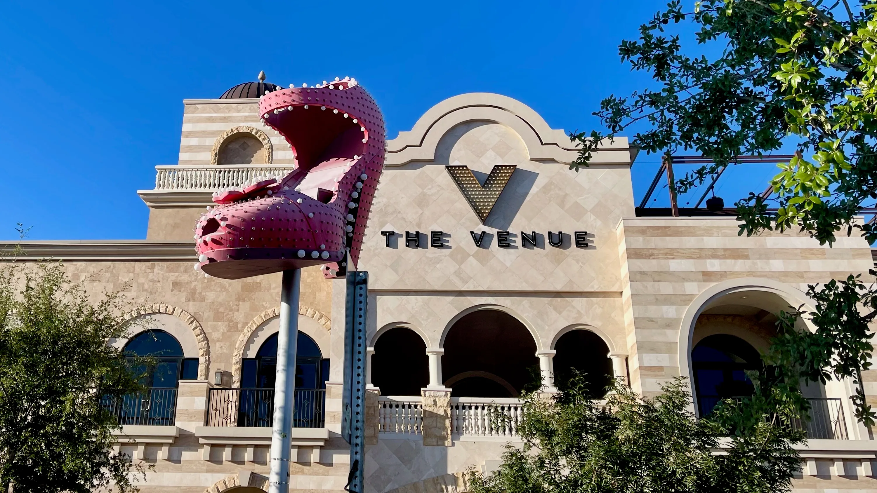 A show in Vegas an art display of a giant pink high heeled shoe
